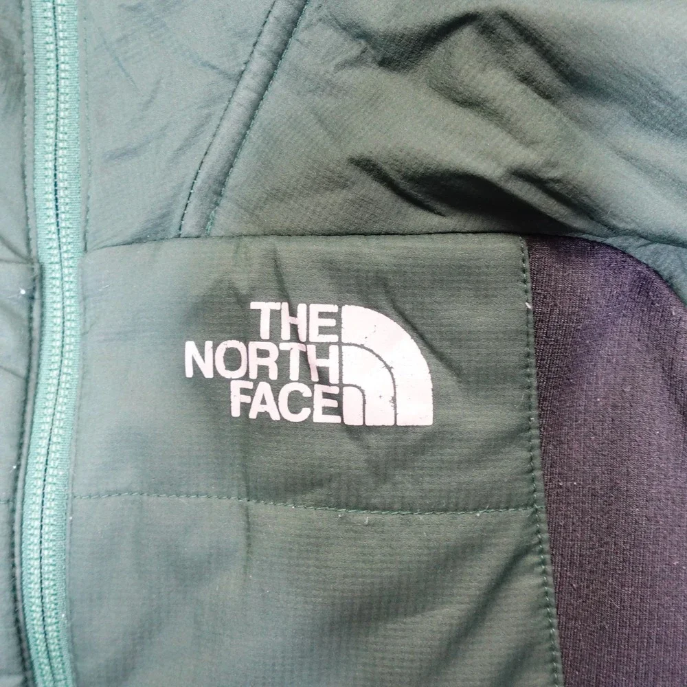 The North Face fading logo